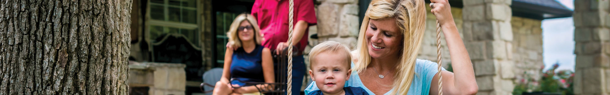 mother-and-baby-on-swing-bg mother-and-baby-on-swing-bg