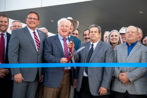 HQ ribbon cutting ceremony close up.