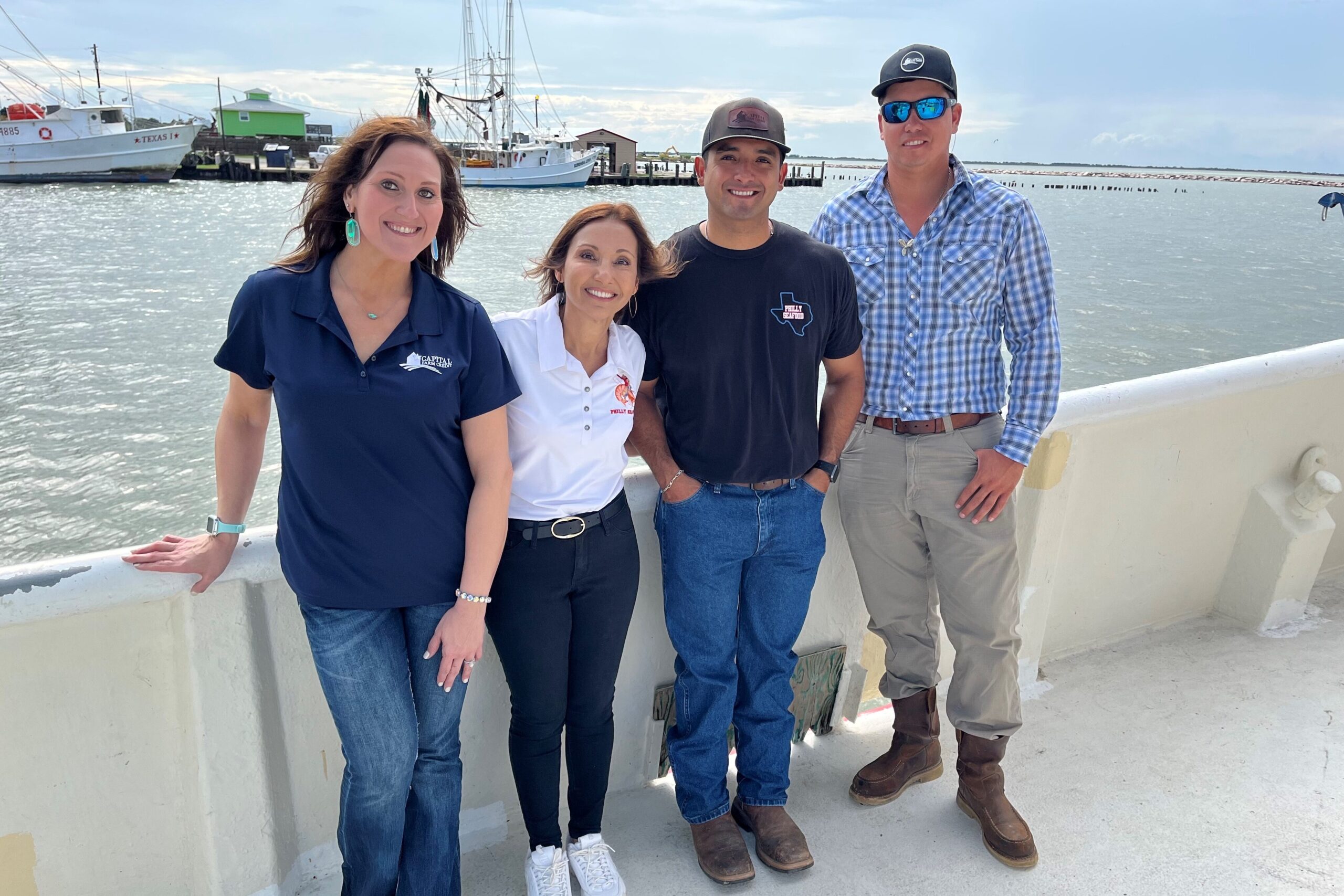The Garcia family in front of their shrimp boat