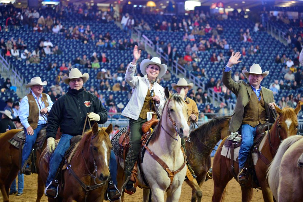 Sharleen on a buck in grand entry