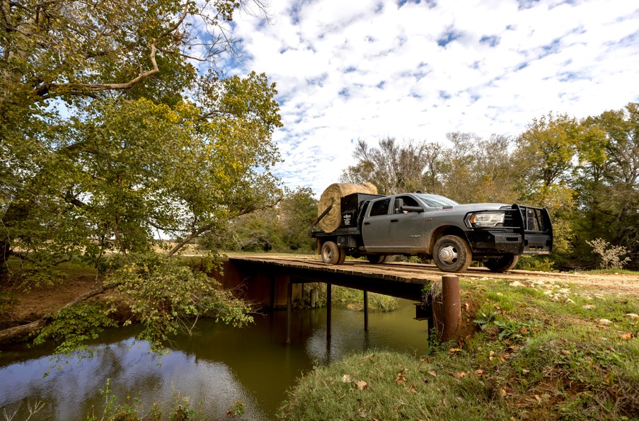 A truck transporting hay.