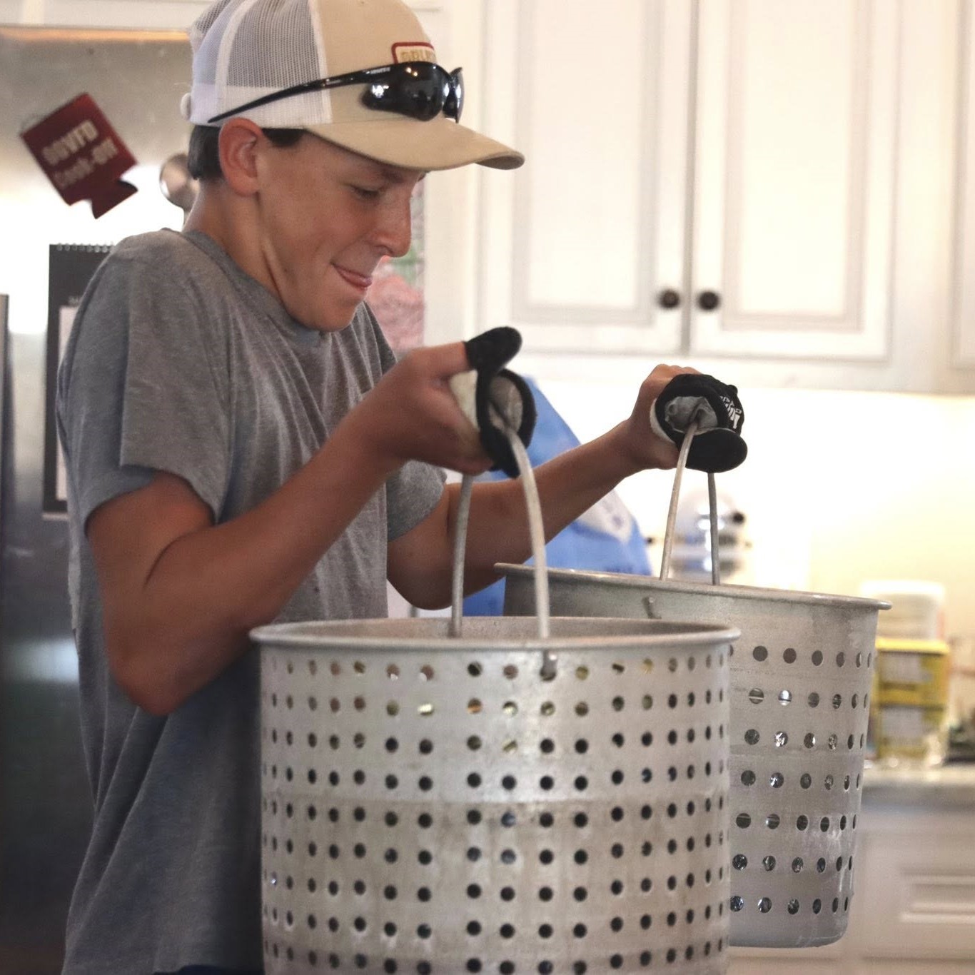 youths canning vegetables for community